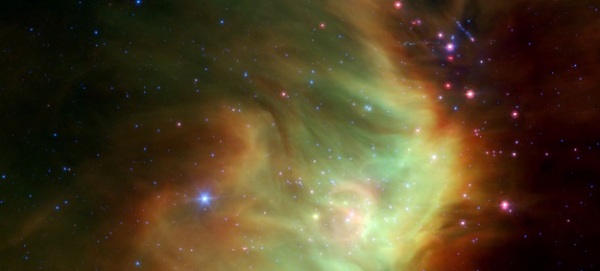 Baby stars are forming near the eastern rim of the cosmic cloud Perseus, revealed in this infrared image from NASA's Spitzer Space Telescope.