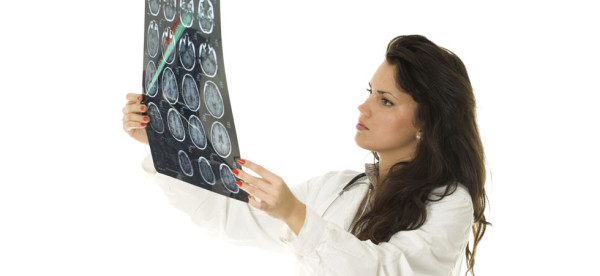 lady doctor keeping tomography brain