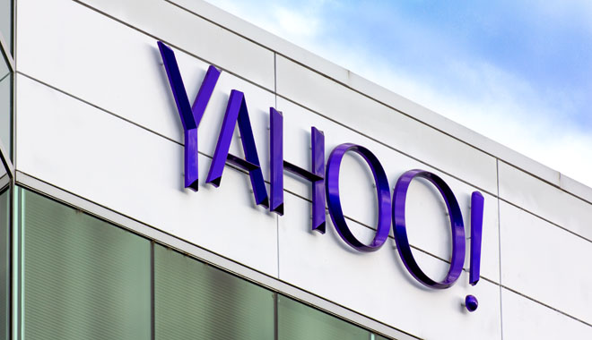 SUNNYVALE, CA/USA - MARCH 1, 2014: Yahoo Corporate Headquarters Sign. Yahoo is an American multinational Internet corporation globally known for its Web portal, search engine Yahoo Search, and related services