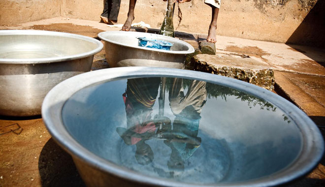 Children fill containers with water from a communal foot-activated pump, in the village of Kiendi-Walogo, Zanzan Region. In November 2011, Cτte d’Ivoire continues to recover from the violence that erupted after the 28 November 2010 presidential election. Over 185,000 people are still displaced, while more than 163,000 Ivoirians remain refugees in nearby countries, mainly Liberia. In the north-eastern Zanzan Region, the conflict worsened an already precarious existence where poverty affects over half of the population and food insecurity remains prevalent. Over 40 per cent of children are chronically malnourished, while the region’s rate of moderate acute malnutrition – 7.7 per cent – is the highest in the country. Over 30 per cent of the population lacks access to safe drinking water, while nearly 70 per cent lacks access to improved sanitation facilities. The region has a 16 per cent under-five morality rate, exceeding the already high national figure. Regional primary school enrolment is a low 40 per cent and is even lower among girls. Further, approximately 60 per cent of the region’s children do not possess a birth certificate, a basic requirement for accessing social services. In the context of a refocused equity approach, UNICEF, in coordination with the Government and other partners, continues to support efforts in health, including the treatment and prevention of HIV, nutrition, water, sanitation and hygiene, education and child protection.